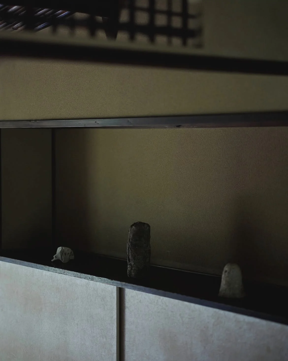 A row of small objects in a traditional interior