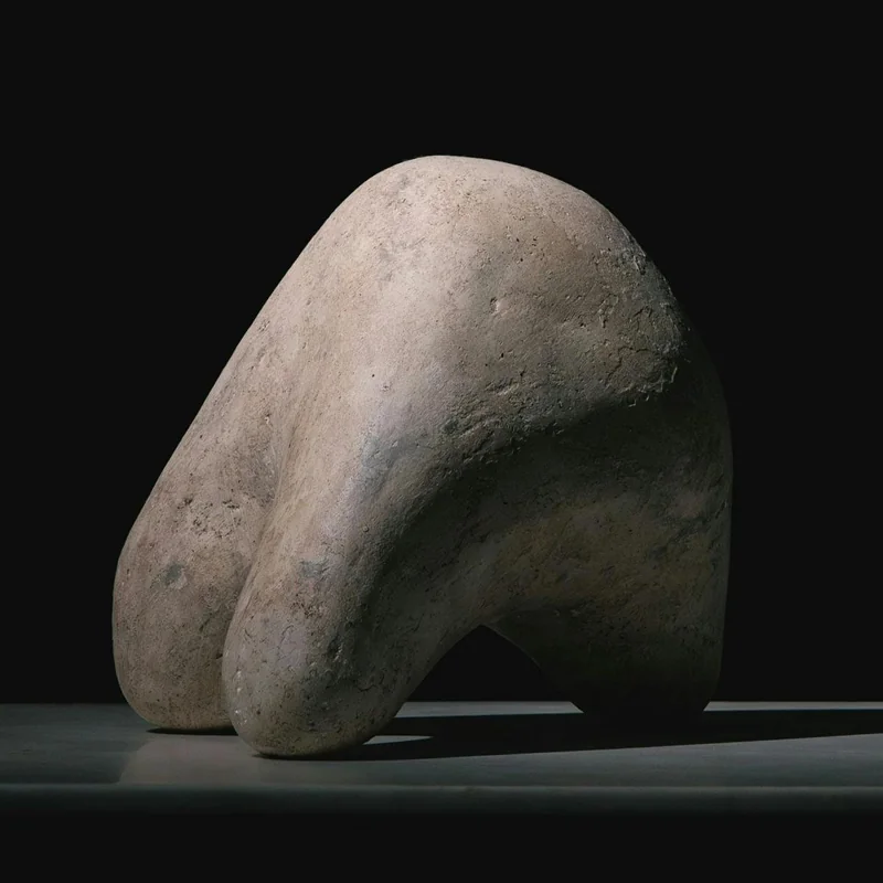 A curved form that folds back towards its base.